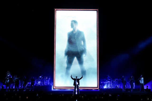 <p>Kevin Mazur/Getty</p> Justin Timberlake performing in Vancouver on April 29, 2024
