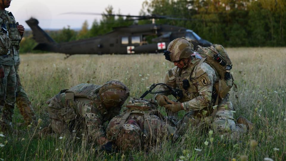 Paratroopers conduct air medical evacuation training using UH-60 Black Hawk helicopters at Grafenwoehr, Germany, on Aug. 23, 2023. (Kevin Sterling Payne/U.S. Army)