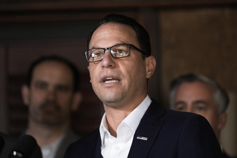 Pennsylvania Gov. Josh Shapiro speaks with members of the media during a news conference in Yardley, Pa., Monday, Dec. 4, 2023. A protest in Philadelphia calling for the end of the siege in Gaza drew criticism from Shapiro as being a “blatant act of antisemitism” after protesters gathered at a Jewish restaurant. (AP Photo/Matt Rourke)