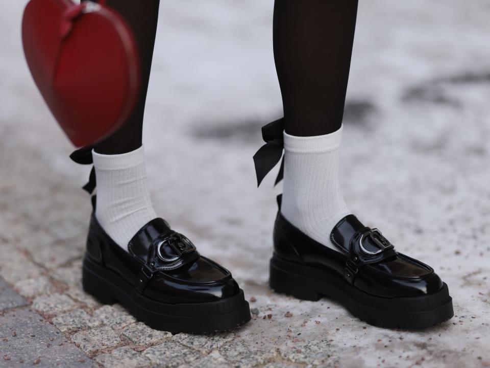 Loafers and long socks.