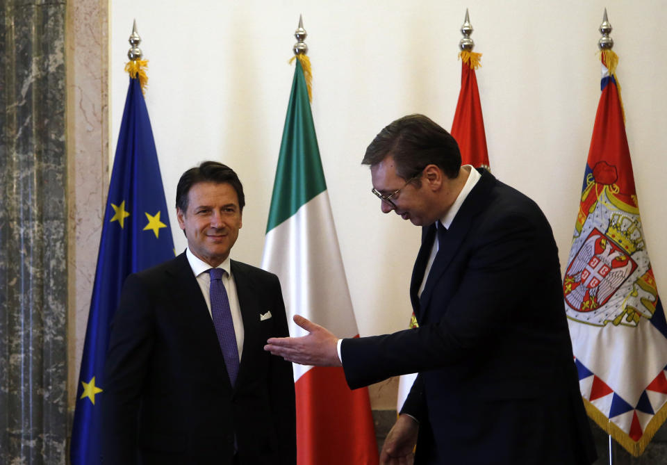 Serbian President Aleksandar Vucic, right, welcomes Italian Prime Minister Giuseppe Conte in Belgrade, Serbia, Wednesday, March 6, 2019. Conte is on a one-day official visit to Serbia. (AP Photo/Darko Vojinovic)