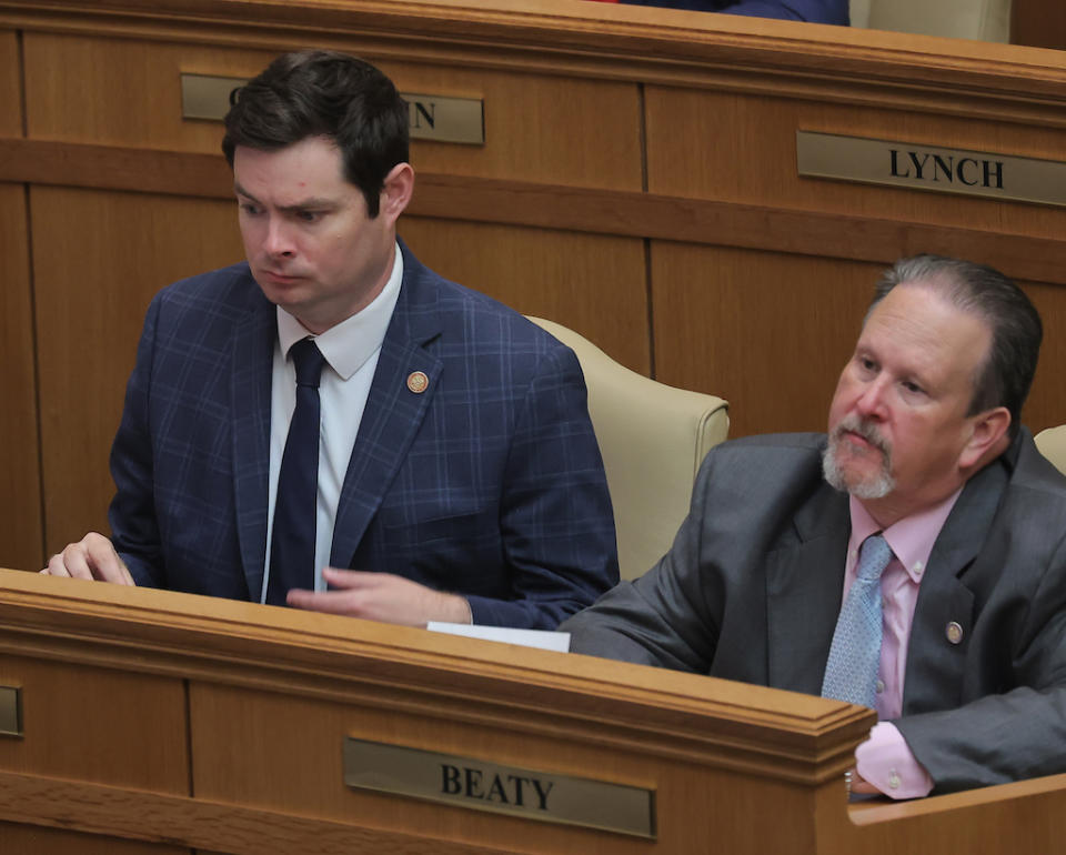  Republican Reps. David Ray of Maumelle (left) and Howard Beaty of Crossett listen to the Speaker on the House floor Monday, September 11, 2023. (John Sykes/Arkansas Advocate)