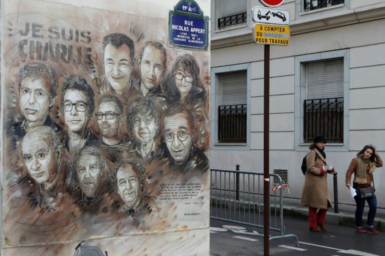 Fresque en hommage aux victimes de l'attaque à Charlie Hebdo, rue Nicolas Appert à Paris, où se trouvaient les locaux du journal en 2015. - FRANCOIS GUILLOT © 2019 AFP