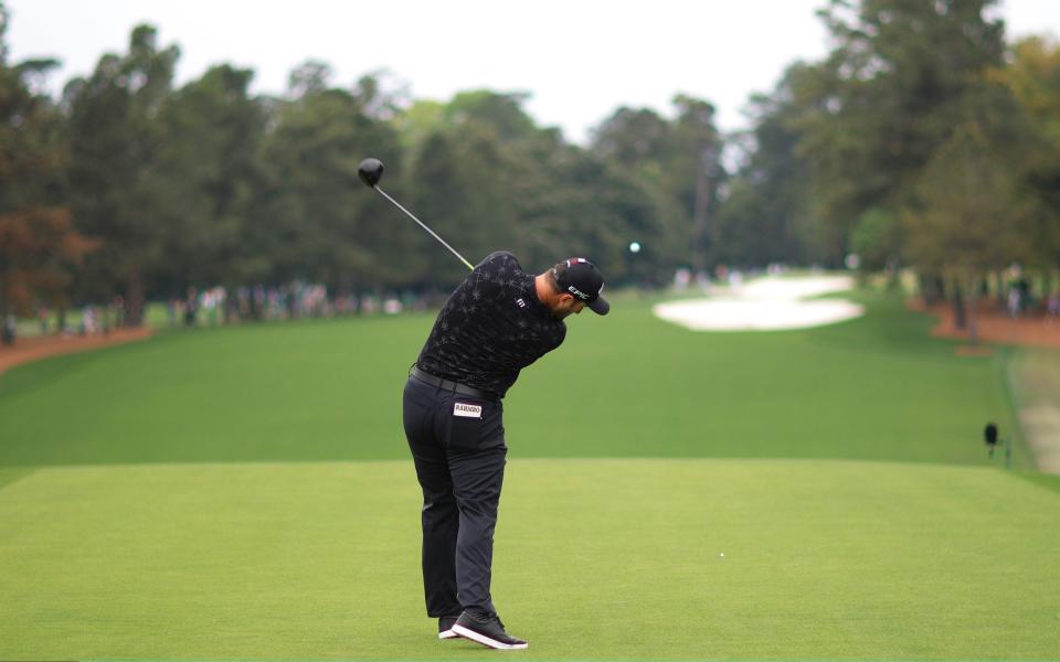 Jon Rahm of Spain plays his shot from the first tee during the third round of the Masters at Augusta National Golf Club  - Getty Images