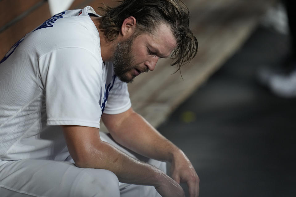 Los Angeles Dodgers starting pitcher Clayton Kershaw reacts after exiting during the first inning in Game 1 of a baseball NL Division Series against the Arizona Diamondbacks, Saturday, Oct. 7, 2023, in Los Angeles. (AP Photo/Ashley Landis)