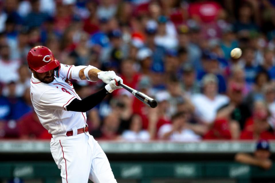 Cincinnati Reds right fielder Albert Almora Jr. (3) hits a solo home run in the second inning of the MLB game between the Cincinnati Reds and the Los Angeles Dodgers in Cincinnati at Great American Ball Park on Tuesday, June 21, 2022. 