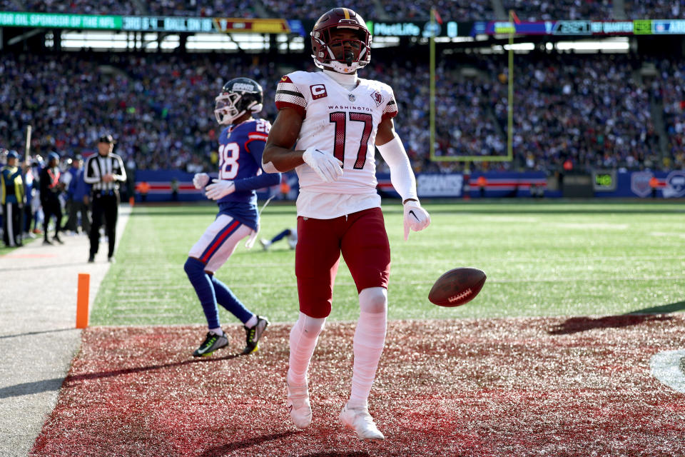 Terry McLaurin #17 of the Washington Commanders scores a touchdown in the first quarter of a game against the New York Giants. (Photo by Al Bello/Getty Images)