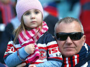 A Young Roosters fan pays tribute.