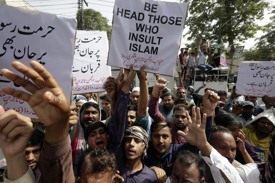Pakistani traders demonstrate to condemn derogatory references to Islam and the Prophet Muhammad recently made by Nupur Sharma, a spokesperson of the governing Indian Hindu nationalist party, Friday, June 10, 2022, in Lahore, Pakistan. (AP Photo/K.M. Chaudary)