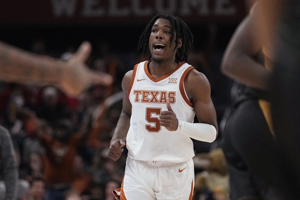 Texas guard Marcus Carr (5) reacts to a score against Texas A&M-Commerce during the second half of an NCAA college basketball game in Austin, Texas, Tuesday, Dec. 27, 2022. (AP Photo/Eric Gay)