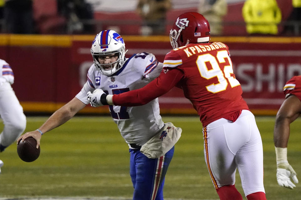 Buffalo Bills quarterback Josh Allen is sacked by Kansas City Chiefs defensive end Tanoh Kpassagnon (92) during the second half of the AFC championship NFL football game, Sunday, Jan. 24, 2021, in Kansas City, Mo. (AP Photo/Jeff Roberson)