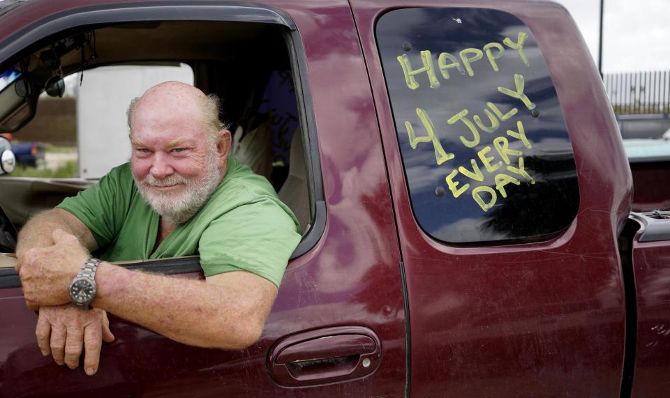 Rusty Monsees, owner of land that members of the "Patriots" are camped at near the U.S.-Mexico border, poses for a portrait at the camp outside Brownsville, Texas September 2, 2014. Monsees, 66, said "illegals" have poisoned his dogs and sprayed the windows of his house with bullets but he refuses to abandon his property. The "Patriots" are a heavily armed group who patrol the U.S. border with Mexico, trying to deter immigrants from crossing the border illegally. The group, who portray themselves as defending the American way, use a strong display of force to intimidate anyone from making the crossing from Mexico into Texas. To critics, they are vigilantes spoiling for a fight. To the immigrants, they are another barrier to entry and to the U.S. Border Patrol, groups like this can either be a nuisance interfering with their operations or an aide in spotting migrants illegally trying to enter the country. Picture taken September 2, 2014. REUTERS/Rick Wilking (UNITED STATES - Tags: POLITICS SOCIETY IMMIGRATION CRIME LAW) ATTENTION EDITORS: PICTURE 08 OF 20 FOR WIDER IMAGE PACKAGE 'DEFENDING THE AMERICAN WAY'. TO FIND ALL IMAGES SEARCH 'BROWNSVILLE WILKING'