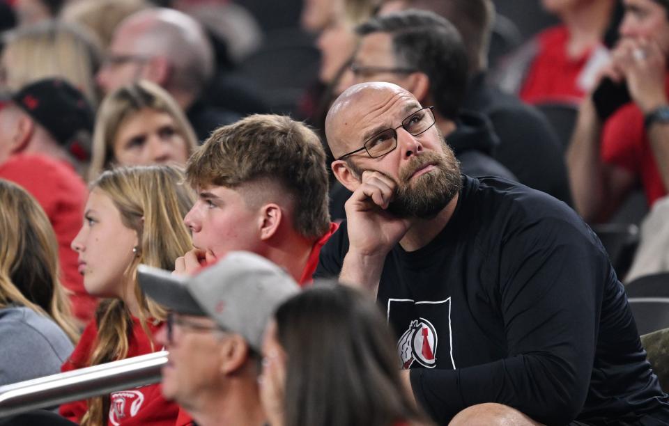 A Utah Utes fan looks up at the scoreboard as Utah and Northwestern play in the SRS Distribution Las Vegas Bowl on Saturday, Dec. 23, 2023. | Scott G Winterton, Deseret News