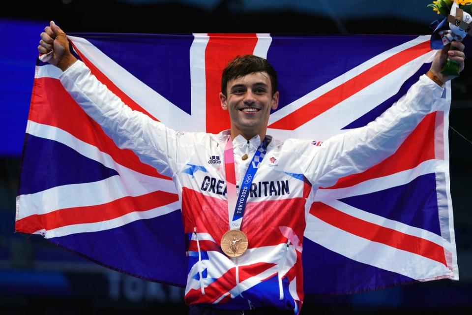 Tom Daley with a bronze medal following the Men’s 10m Platform Final at the Tokyo Aquatics Centre on the fifteenth day of the Tokyo 2020 Olympic Games in Japan (PA)