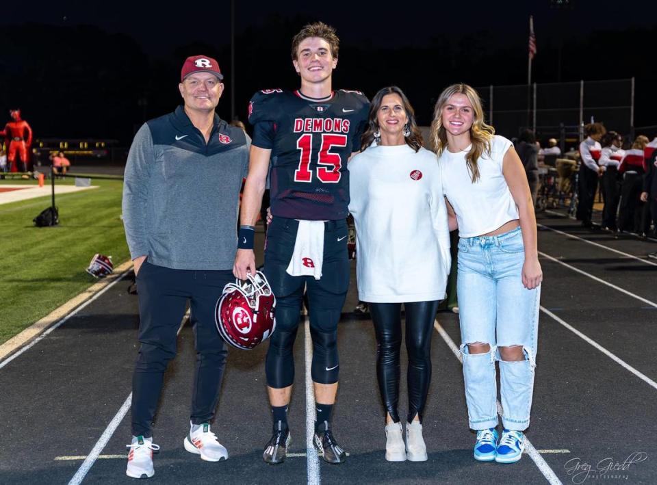 UM football quarterback commit Judd Anderson shown on 2023 Senior Day, from left, with his father Wade, mother Rachel and sister Georgia Mae. Greg Giedd Photography.