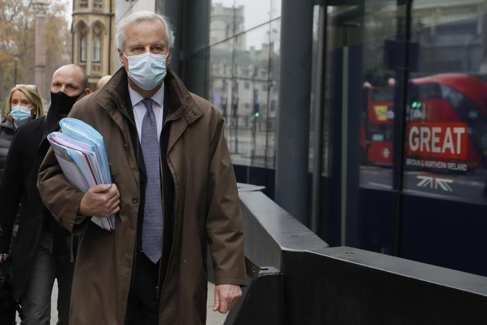 EU Chief Negotiator Michel Barnier walks to a conference centre in Westminster in London, Sunday, Nov. 29, 2020. Teams from Britain and the European Union are continuing face-to-face talks on a post-Brexit trade deal in the little remaining time. (AP Photo/Kirsty Wigglesworth)