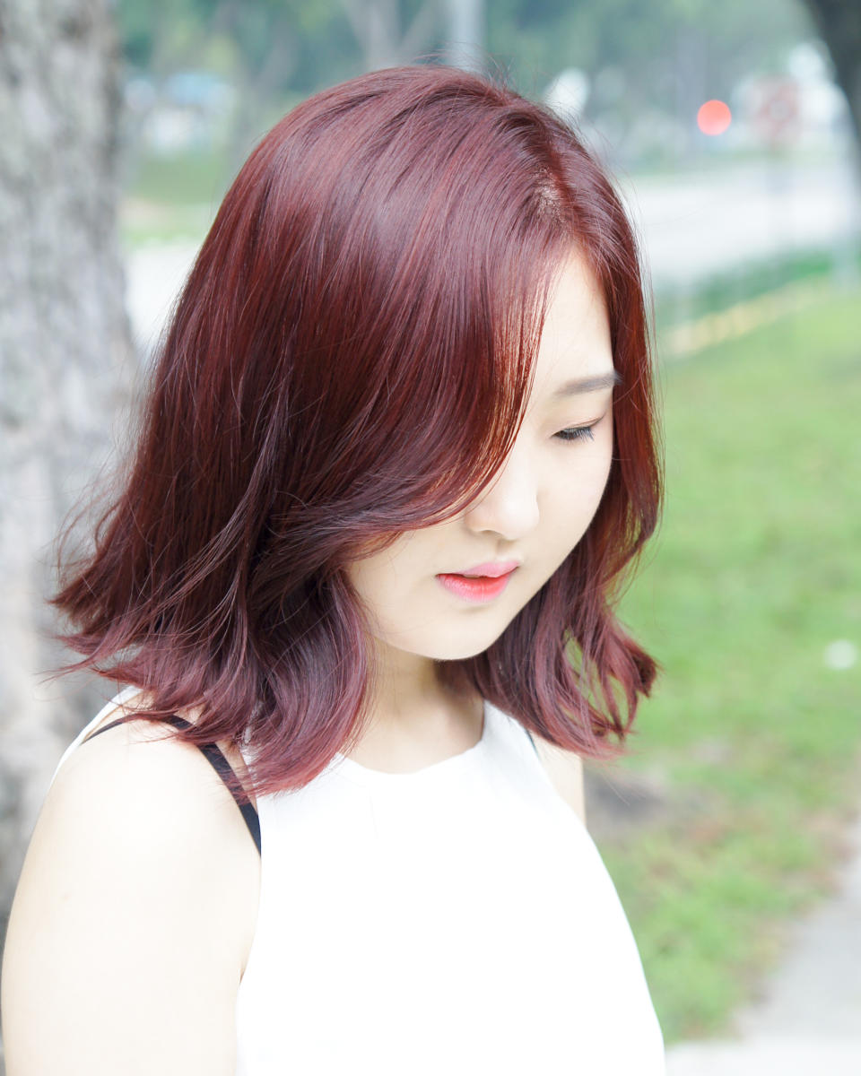 <em>Red Hair Colour by <a href="http://www.beautyundercover.sg/hair/style-na-korean-hair-salon-parkway-parade/" rel="nofollow noopener" target="_blank" data-ylk="slk:Style NA Korean Salon @ Parkway Parade;elm:context_link;itc:0;sec:content-canvas" class="link ">Style NA Korean Salon @ Parkway Parade</a></em>