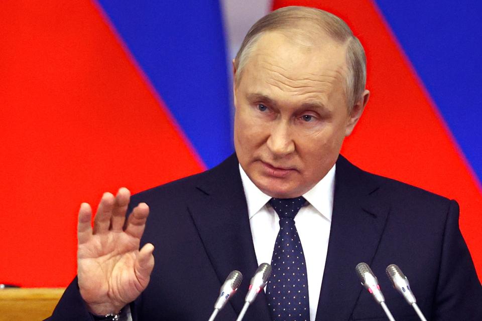 Russian President Vladimir Putin gestures while addresses a meeting of the Council of Legislators under the Russian Federal Assembly at the Tauride Palace, in St. Petersburg, Russia, Wednesday, April 27, 2022. (Alexander Demyanchuk, Sputnik, Kremlin Pool Photo via AP)