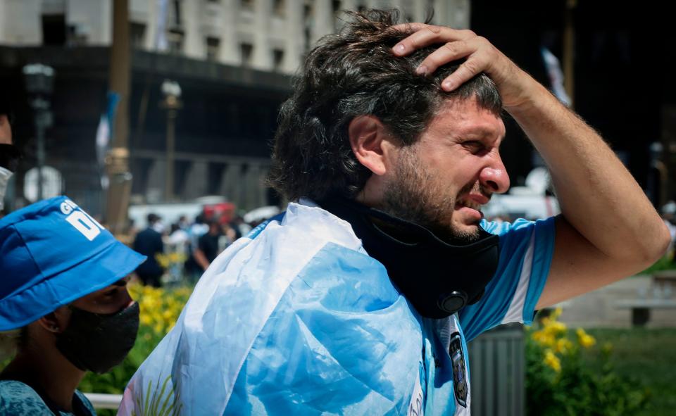 <p>A devastated fan following Diego Maradona’s death</p>AFP via Getty Images