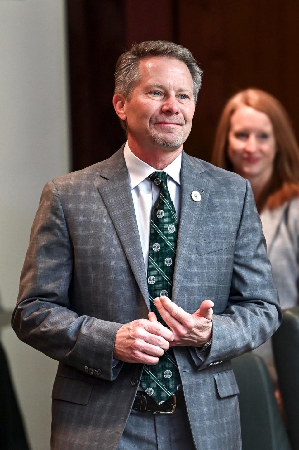 Michigan State University President-Elect Kevin Guskiewicz approaches the podium before a press conference on Monday, Dec. 11, 2023, at the Hannah Administration Building in East Lansing.