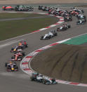 Mercedes driver Lewis Hamilton of Britain leads the field into turn three at the start of the Chinese Formula One Grand Prix at Shanghai International Circuit in Shanghai, Sunday, April 20, 2014. (AP Photo/Eugene Hoshiko)