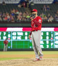 Los Angeles Angels relief pitcher Justin Anderson reacts after issuing a bases-loaded walk to Texas Rangers' Shin-Soo Choo which scored Jurickson Profar to tie the score during the eighth inning of a baseball game, Thursday, Aug. 16, 2018, in Arlington, Texas. Texas won 8-6. (AP Photo/Jeffrey McWhorter)