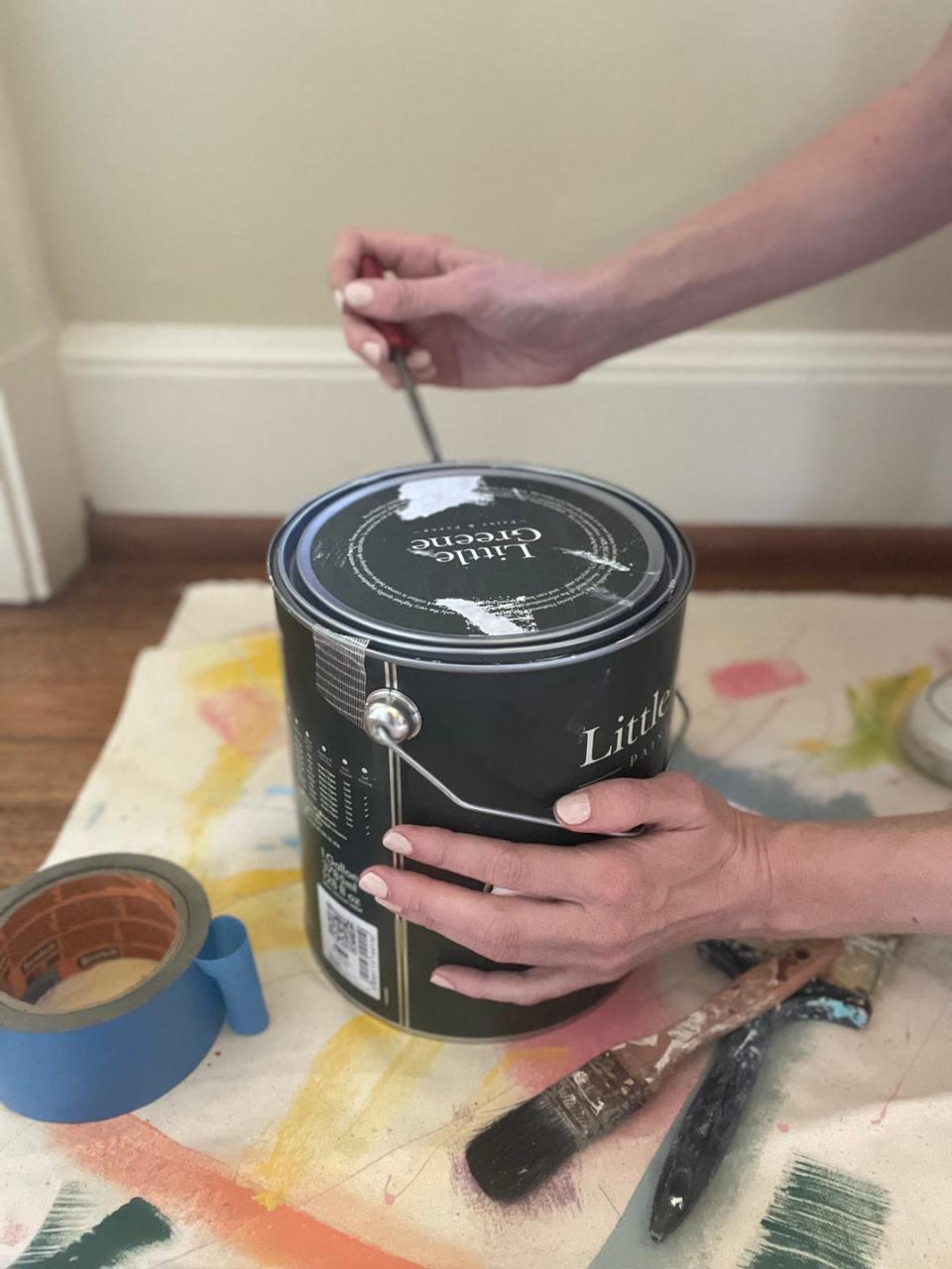 open a paint can with a paint key