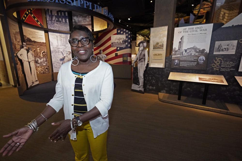 Pamela Junior, director of The Two Mississippi Museums, speaks about the historical roots of Juneteenth, as she stands before the entrance exhibits to the Mississippi Civil Rights Museum, Thursday, June 16, 2022, in Jackson. Juneteenth recognizes the day in 1865, when the Emancipation Proclamation— which had been issued on January 1, 1863— was read to enslaved African Americans in Texas. (AP Photo/Rogelio V. Solis)