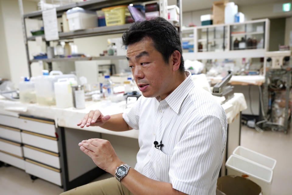 University of Tokyo environmental chemistry professor Katsumi Shozugawa speaks to the Associated Press during an interview Wednesday, July 19, 2023, in Tokyo. Shozugawa said radioactivity of the treated water is so low that once it hits the ocean it will quickly disperse and become almost undetectable, which makes pre-release sampling of the water important for data analysis.(AP Photo/Eugene Hoshiko)