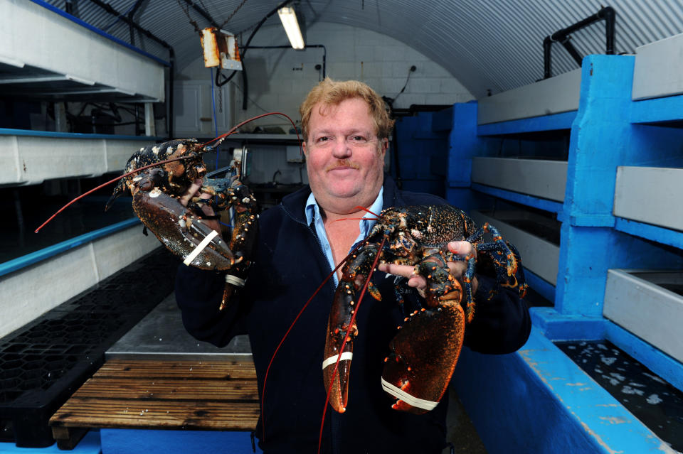 Sam Baron is closing holds shellfish are seen as they are processed by Baron Shellfish in Bridlington for export to the EU (file photo). See SWNS story SWLEshellfish. The owner of the first lobster tank business in Europe’s largest shellfish port has revealed he has been forced to close, alluding to Brexit restraints as the main reason. Baron Shellfish Limited, based in Bridlington, East Yorkshire is to close its doors after 40 years of exporting lobsters and crabs to the EU. As a schoolboy, Sam Baron worked alongside his father to set up the first lobster tank business from scratch. Over the years the business grew alongside Bridlington Harbour, which became the biggest shellfish port in the UK.



