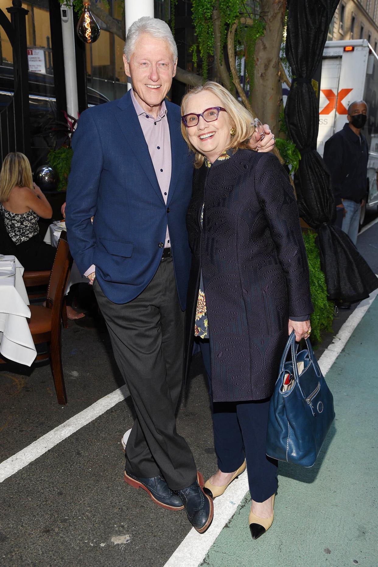 Bill Clinton and Hillary Clinton at Fresco by Scotto Restaurant