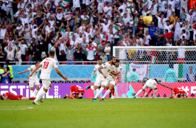 Roozbeh Cheshmi struck Iran's first of two stoppage-time goals