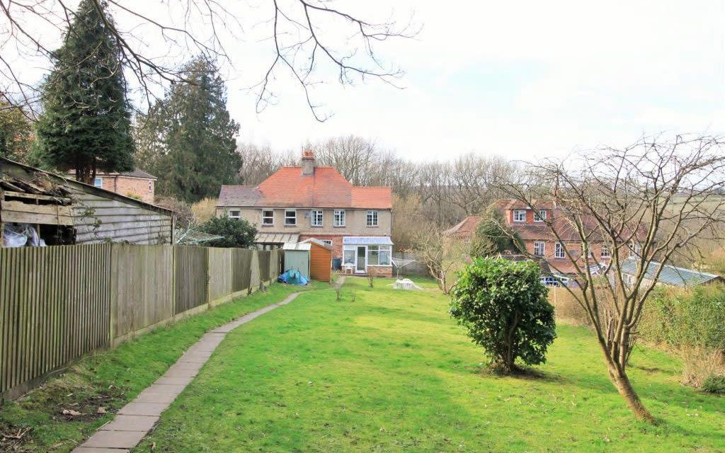 The disputed fence between the semi-detached properties of the Coates and Brian Greenwood and Janice Turner as it was in 2015