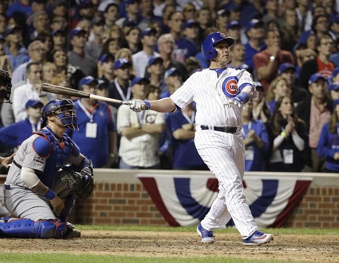 Miguel Montero watches on after launching a pinch-hit grand slam to beat the Dodgers in NLCS Game 1. (AP)
