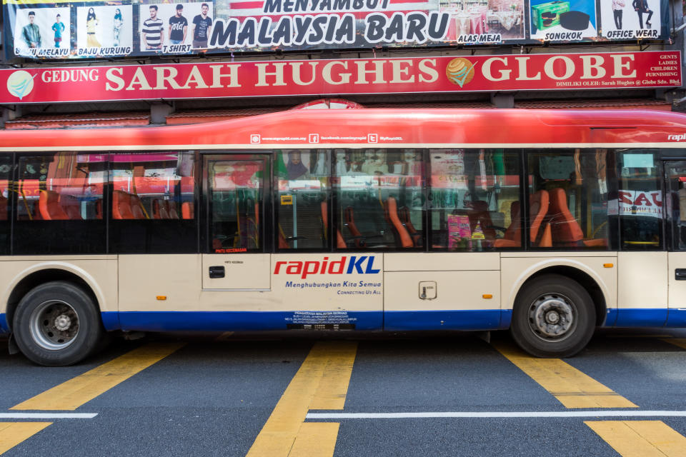 An empty public bus travelling along Jalan Tunku Abdul Rahman in Kuala Lumpur on 18 March 2020, the first day of the Movement Control Order. (PHOTO: Fadza Ishak for Yahoo Malaysia)