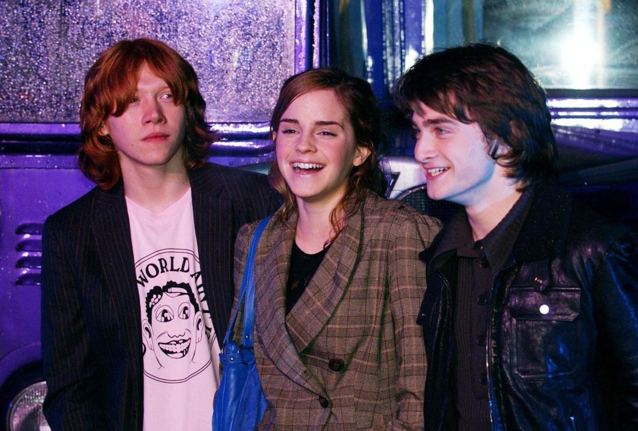 (From left to right) Rupert Grint (Ron), Emma Watson (Hermione), and Daniel Radcliffe (Harry) arrive for the Global DVD & VHS Launch party of Harry Potter And The Prisoner Of Azkaban, at Middle Temple in central London   (Photo by PA Images via Getty Images)