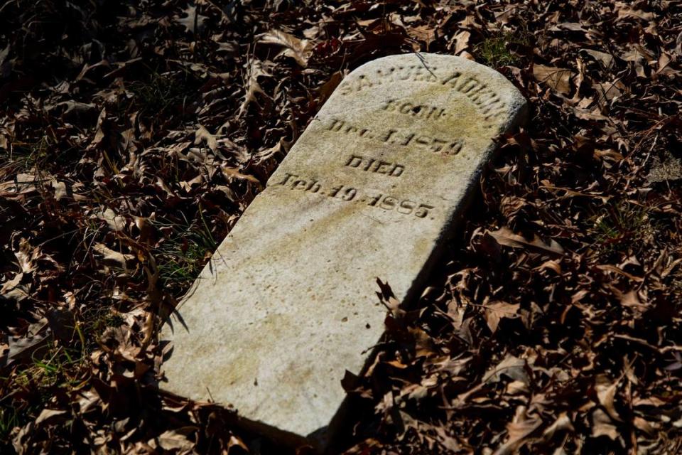 The oldest grave marker, from 1885, found in the Oak Grove Cemetery, which was founded by freed African-Americans after the Civil War and now has lost more of its tree buffer to widening of the I-440 Beltline, that separated it from the rest of the Method community in the 1960s, on Wednesday, Feb. 17, 2021, in Raleigh, N.C.