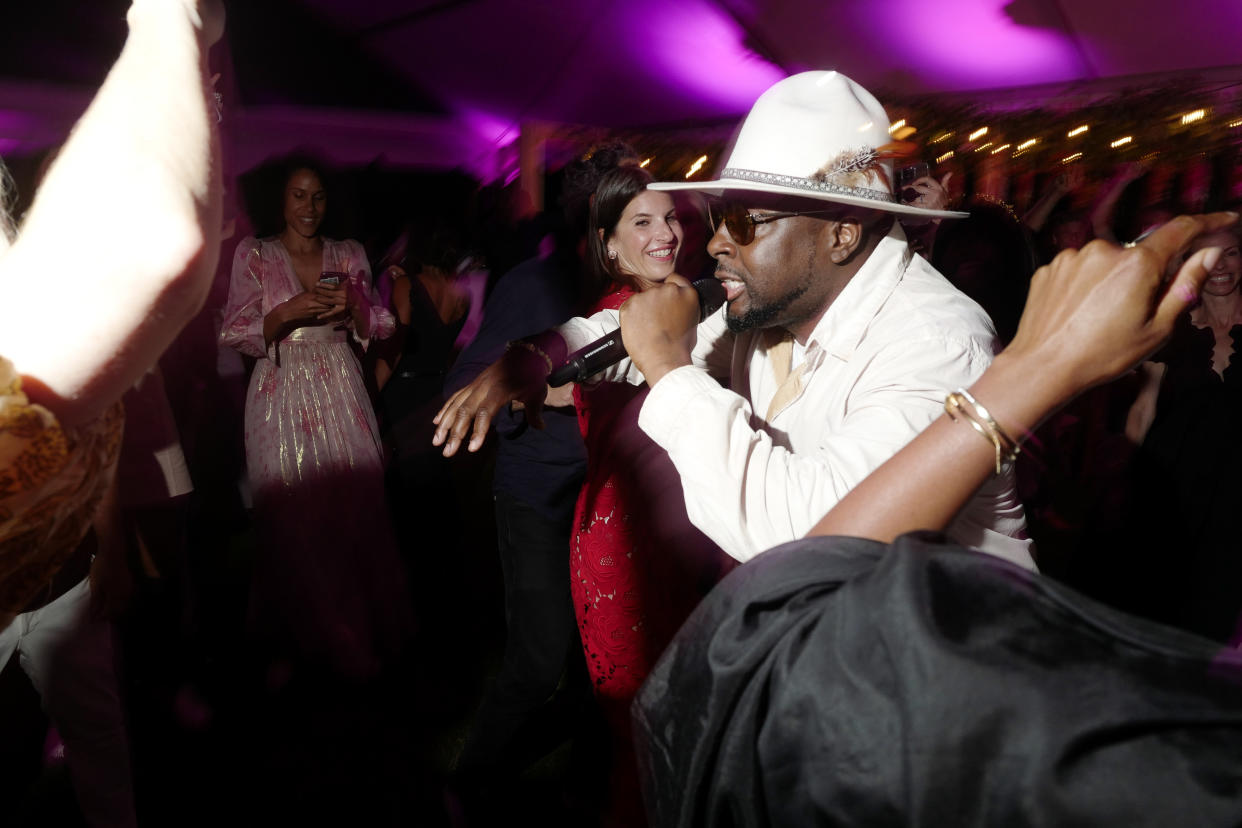 Wyclef Jean amping up the crowd, at the Tod’s East Hampton dinner. - Credit: David Benthal/BFA.com