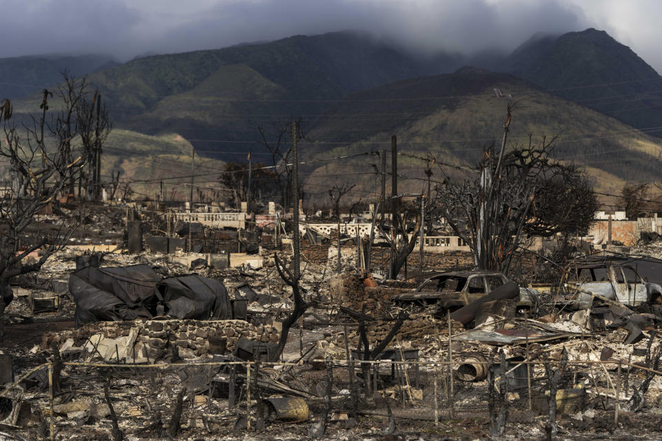 FILE - A general view shows the aftermath of a wildfire in Lahaina, Hawaii, Monday, Aug. 21, 2023. Hawaii's top public utility officials and the president of Hawaiian Electric are expected to testify Thursday, Sept. 28, in a congressional hearing about the role the electrical grid played in last month's deadly Maui wildfire. (AP Photo/Jae C. Hong, File)