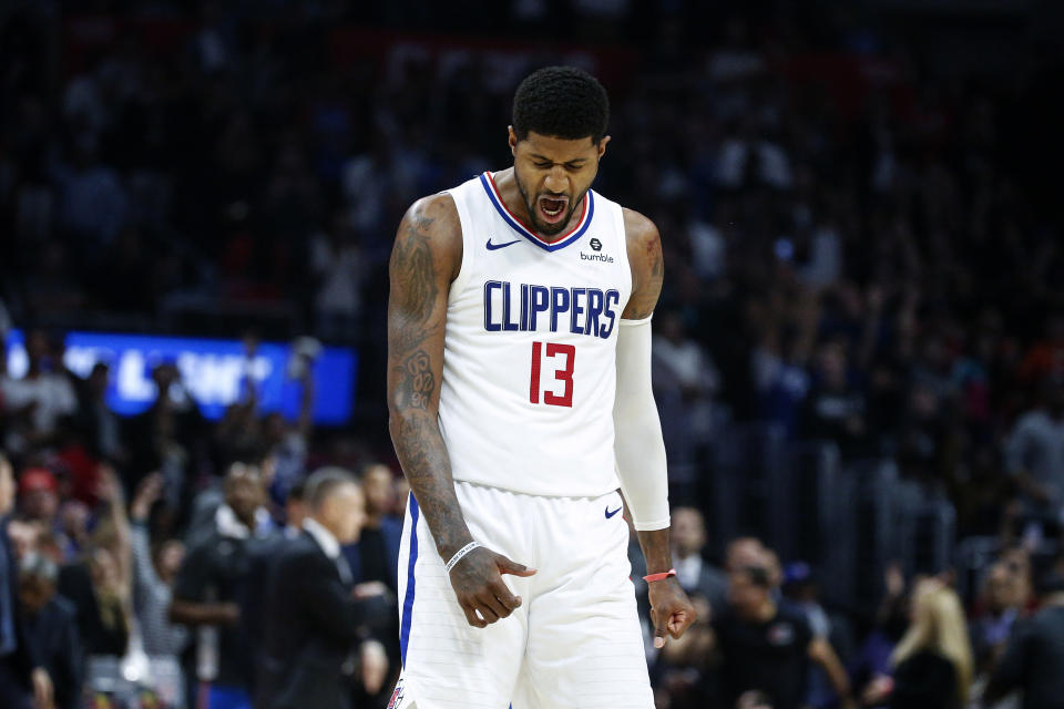 Los Angeles Clippers' Paul George (13) reacts after hitting a 3-point shot against the Oklahoma City Thunder during the second half of an NBA basketball game, Monday, Nov. 18, 2019, in Los Angeles. The Clippers won 90-88. (AP Photo/Ringo H.W. Chiu)