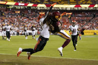 Washington Football Team wide receiver Cam Sims (89) catches a pass with coverage by Cincinnati Bengals defensive back Winston Rose (39) during the first half of a preseason NFL football game Friday, Aug. 20, 2021, in Landover, Md. The catch was ruled incomplete as Sims landed out of bounds. (AP Photo/Susan Walsh)