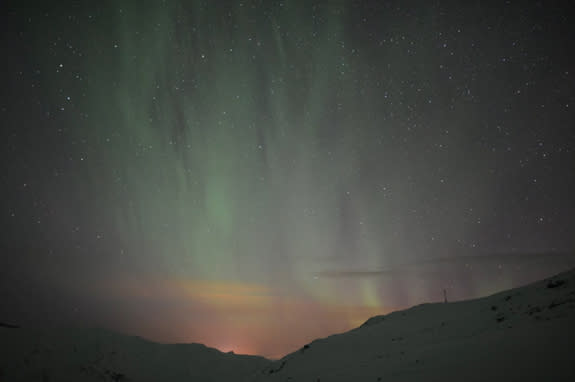 Colorful auroras shimmer over northern Sweden on Feb. 21, 2014 in this image from the video “Lights Over Lapland” by Chad Blakley.