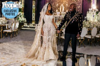 <p>After the Saturday ceremony, Williams changed into a gown by Albina Dyla for their reception ball held at the St. Regis Atlanta.</p>
