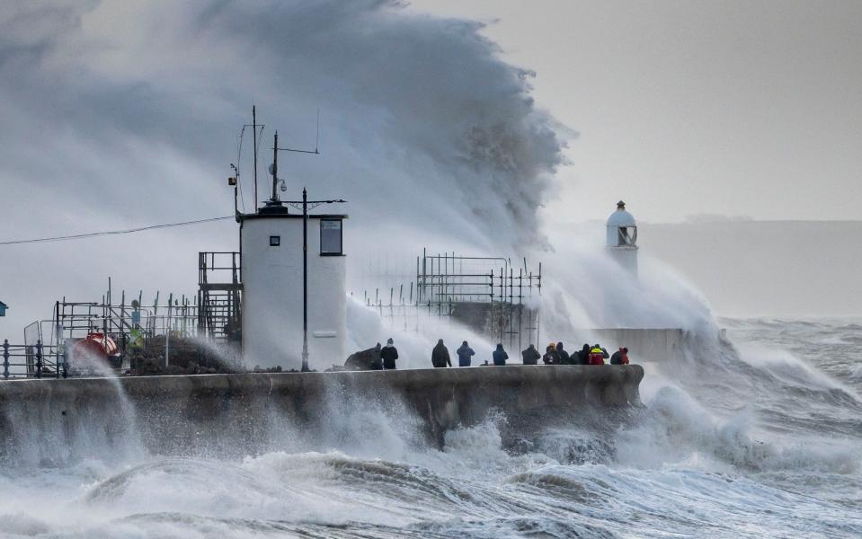 Waves crash against the harbour wall during storm Eunice on February 18 in Porthcawl, Wales - Matthew Horwood/Getty Images