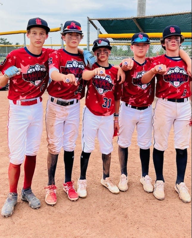 State Line Stars 13U players Nate Trunck, Brady Maxwell, Cashton Sedlar, Tre Eitniear, and Landon Echelberry show off their rings for winning a tournament earlier this summer. The Stars won eight tournaments and finished the season 48-7-1 overall.