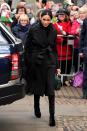 <p>Markle wore a black <a href="https://www.harrods.com/en-gb/stella-mccartney/tie-detail-coat-p000000000005808145?ranMID=36666&ranEAID=8%2Fbtisdd0hQ&ranSiteID=8_btisdd0hQ-aHyVgtiVCTi0R2ZjEoKIJA&cid=LS&siteID=8_btisdd0hQ-aHyVgtiVCTi0R2ZjEoKIJA" rel="nofollow noopener" target="_blank" data-ylk="slk:Stella McCartney coat;elm:context_link;itc:0;sec:content-canvas" class="link ">Stella McCartney coat</a>, trousers by the Welsh fashion house <a href="https://hiutdenim.co.uk/" rel="nofollow noopener" target="_blank" data-ylk="slk:Hiut Denim;elm:context_link;itc:0;sec:content-canvas" class="link ">Hiut Denim</a> and a <a href="https://www.demellierlondon.com/the-mini-venice.html" rel="nofollow noopener" target="_blank" data-ylk="slk:DeMellier 'Mini Venice' bag;elm:context_link;itc:0;sec:content-canvas" class="link ">DeMellier 'Mini Venice' bag</a> for her first royal visit to Cardiff. </p>