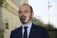 French Prime Minister Edouard Philippe speaks to the media at the Interministerial Crisis Coordination Unit outside the French Interior Ministry, as the spread of the coronavirus disease (COVID-19) continues, in Paris