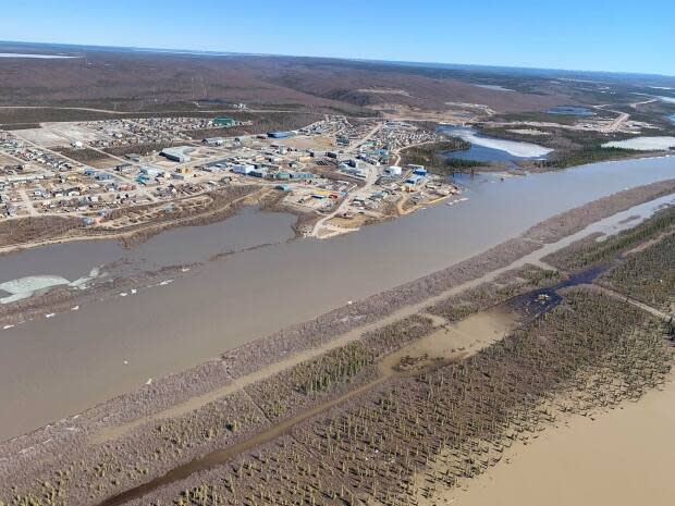 An aerial view of Inuvik, N.W.T., on  June 1, 2020. A scientist with Natural Resources Canada says the water levels are the highest he has seen in 17 years of recorded data.
