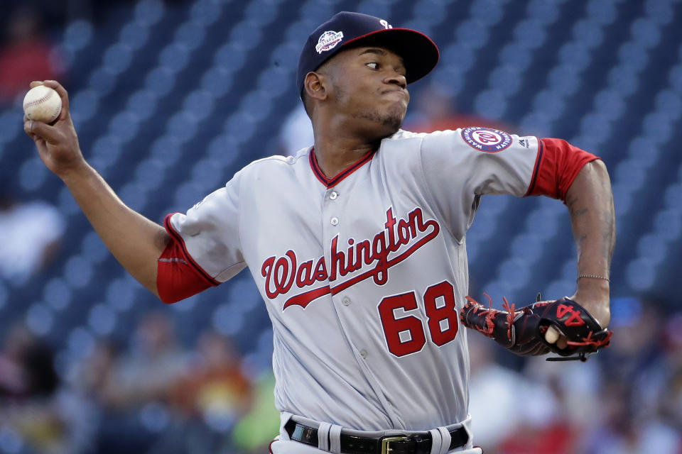 FILE - In this July 9, 2018, file photo, Washington Nationals starting pitcher Jefry Rodriguez delivers in the first inning of a baseball game against the Pittsburgh Pirates in Pittsburgh. A person familiar with the trade says the Cleveland Indians are sending All-Star catcher Yan Gomes to Washington for outfielder Daniel Jonson right-hander Rodriguez. (AP Photo/Gene J. Puskar, File)