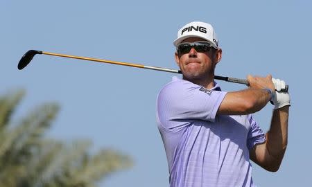 Lee Westwood of England tees off on the tenth hole during the final round of the Dubai Desert Classic February 1, 2015. REUTERS/Fadi Al-Assaad